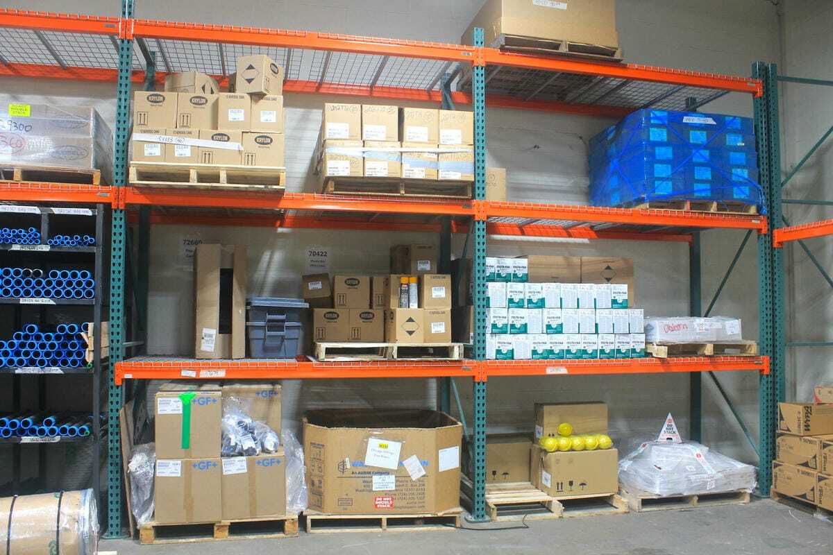 Under-rack bolt bin storage system